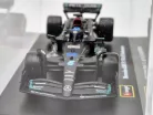 Echipa Mercedes-AMG Petronas W14 F1 #63 (2023) - George Russel - CU PILOT - BBurago - 1:43 - cu mică defecțiune