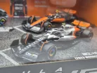 Set McLaren F1 - #4 Lando Norris - GP-ul Marii Britanii 2023 - GP-ul Singapore 2023 - GP-ul Monaco 2023 - Abu Dhabi 2022 - Bburago - 1:43